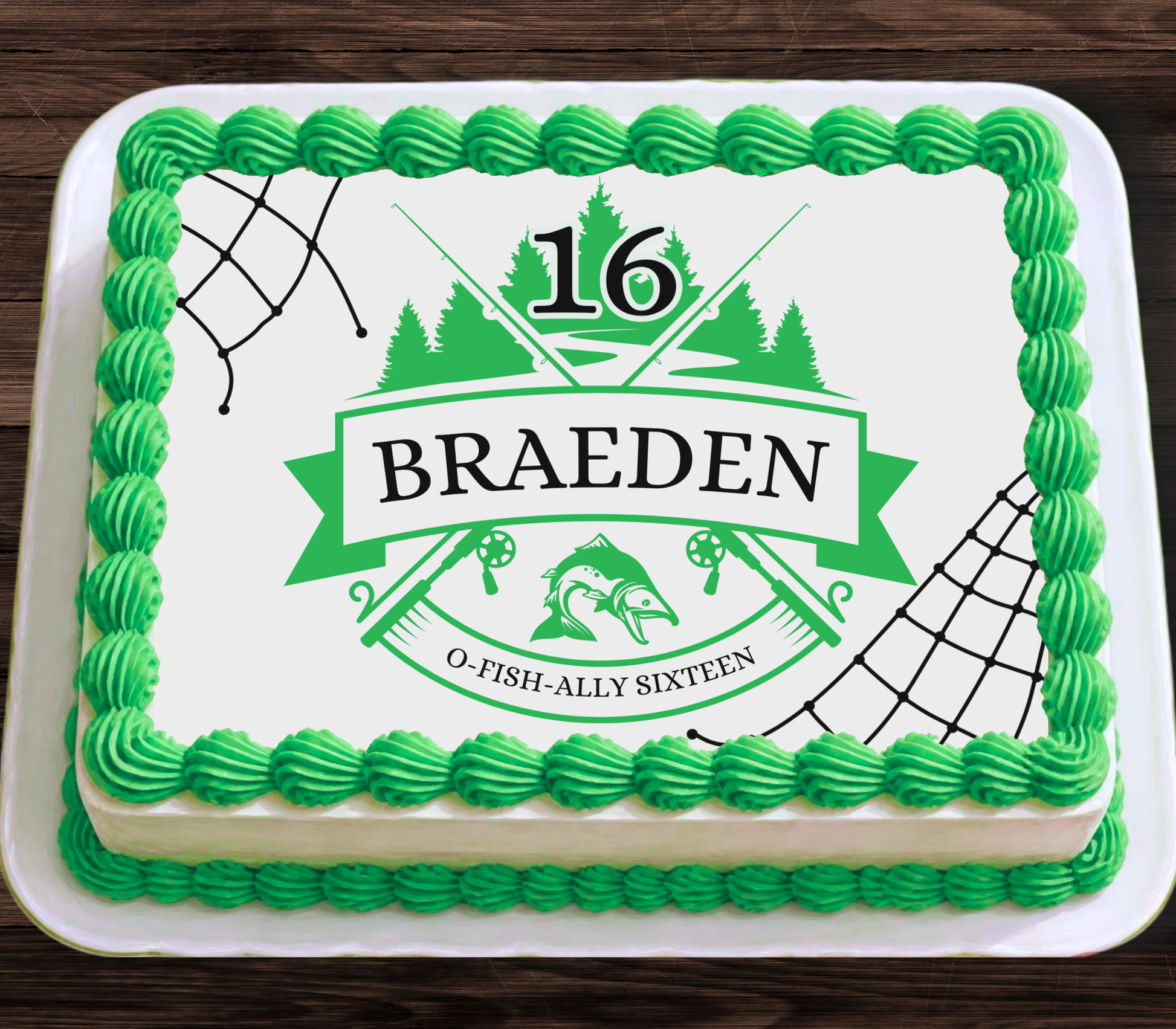 A rectangular frosted cake on a white plate, decorated with bright green piped frosting around the border and a white top featuring a green fishing-themed graphic with the number 16, the name BRAEDEN, and the phrase O-FISH-ALLY SIXTEEN.