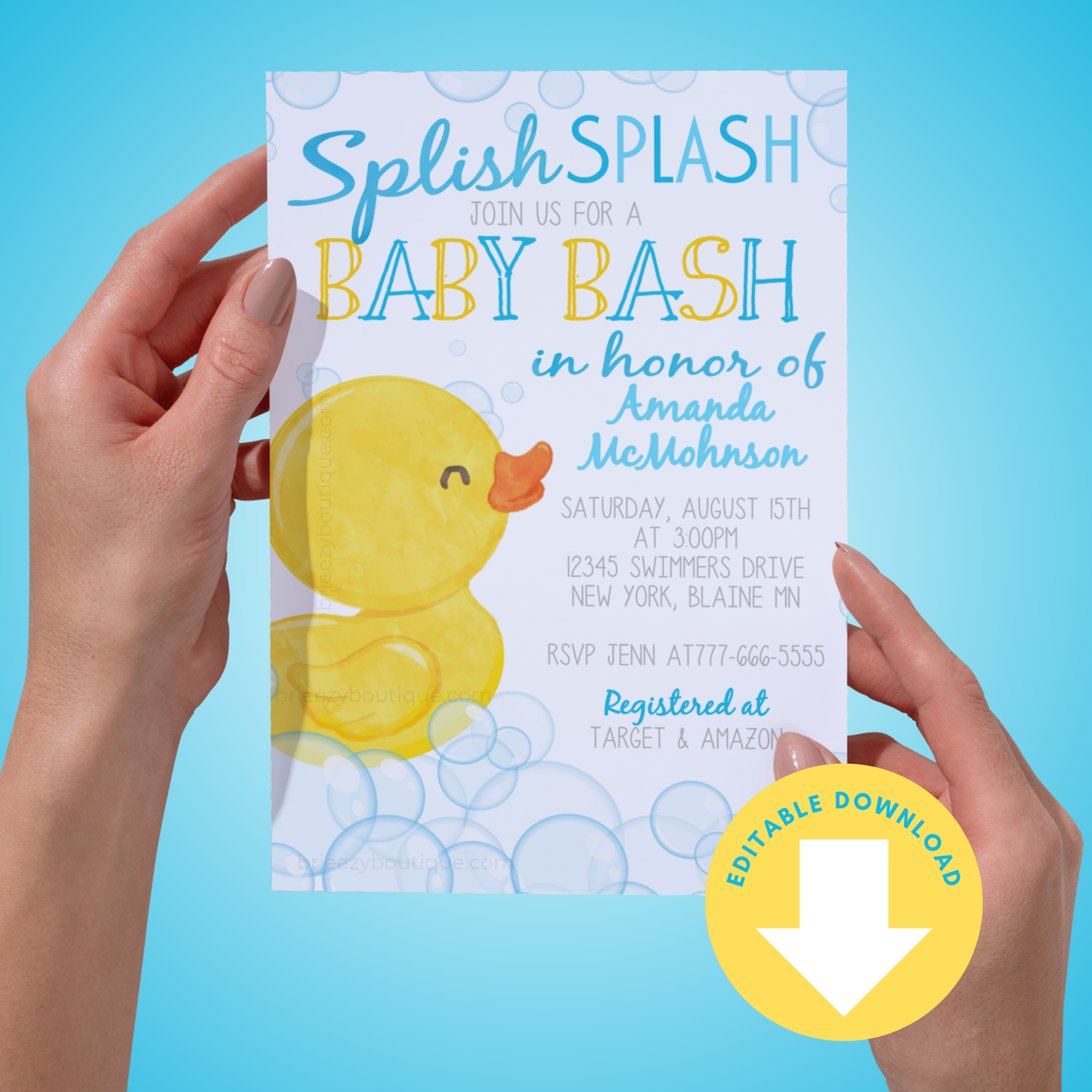 Baby shower invitation with rubber duck design held by hands against a blue background